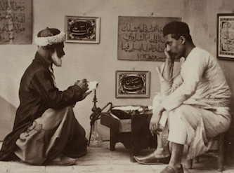 A late 19th century Damascene scribe taken by French photographer Jean-Baptiste Charlier ca. 1870. The Fouad Debbas Collection. Courtesy of Sursock Museum.